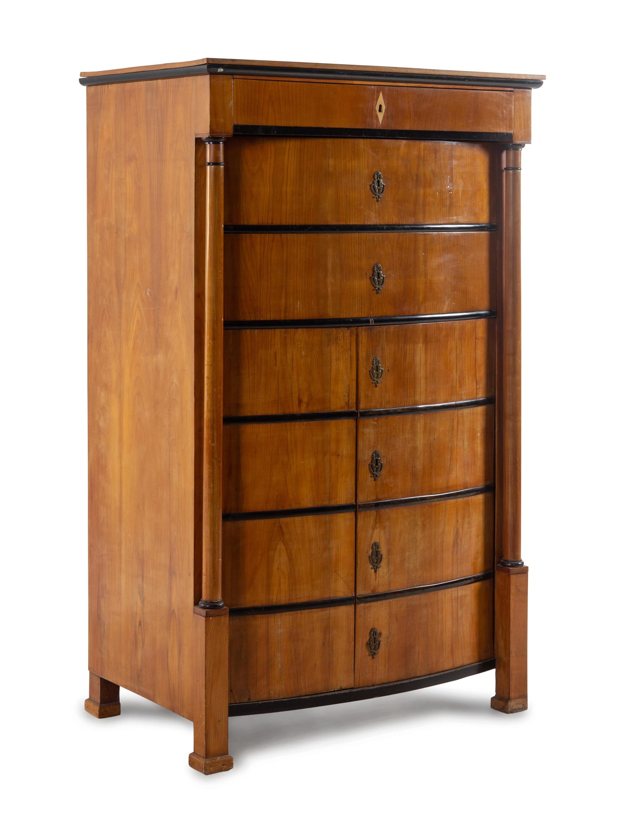 A Biedermeier Parcel Ebonized Walnut Tall Chest of Drawers