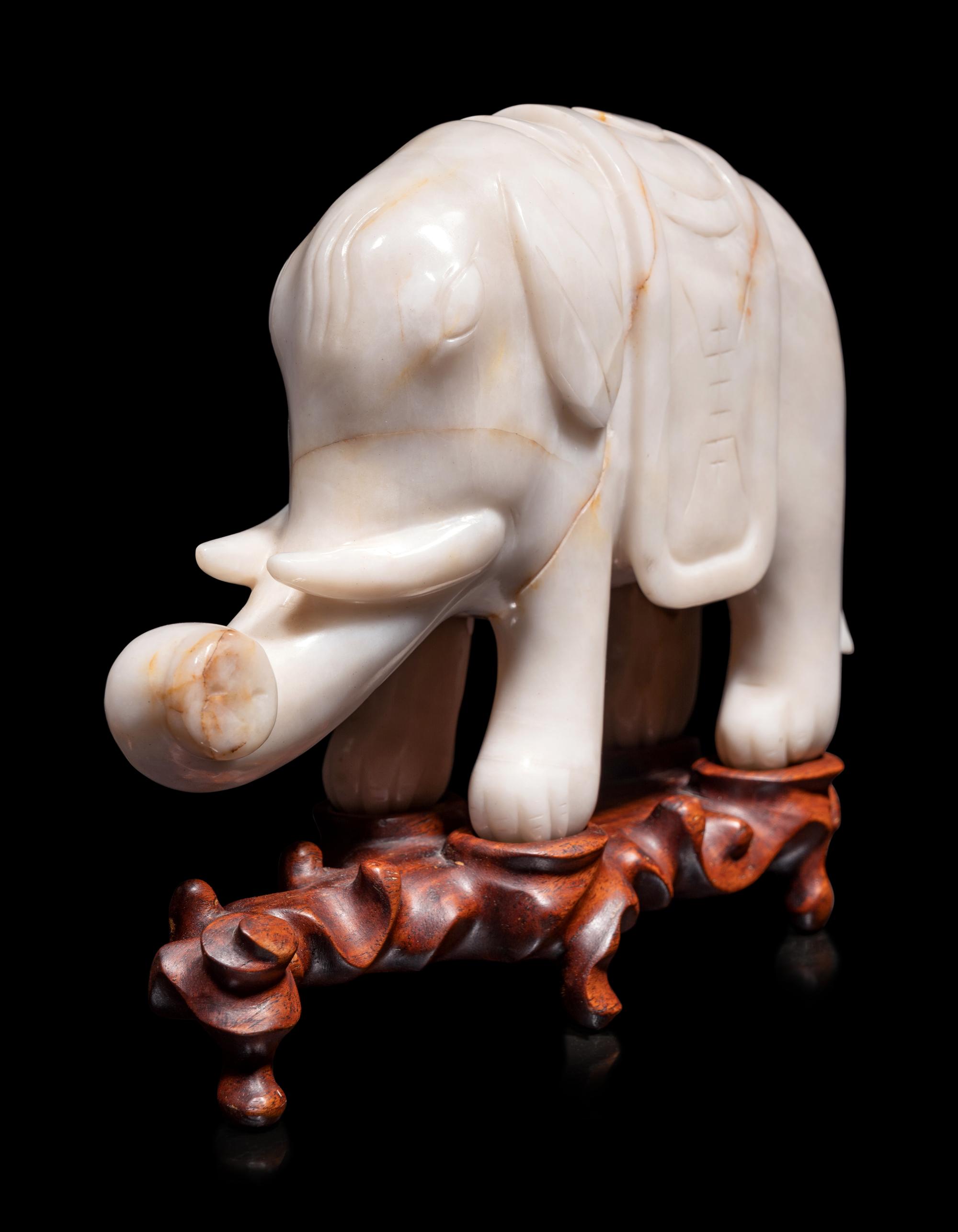 A Pair of Chinese Carved Hardstone Figures of Elephants