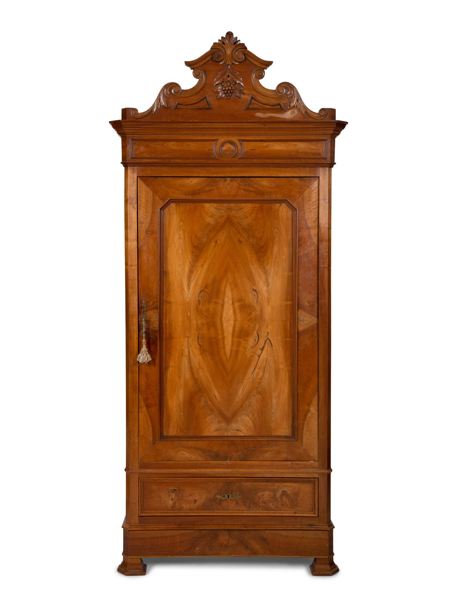 An Italian Figured Walnut Wardrobe Cabinet