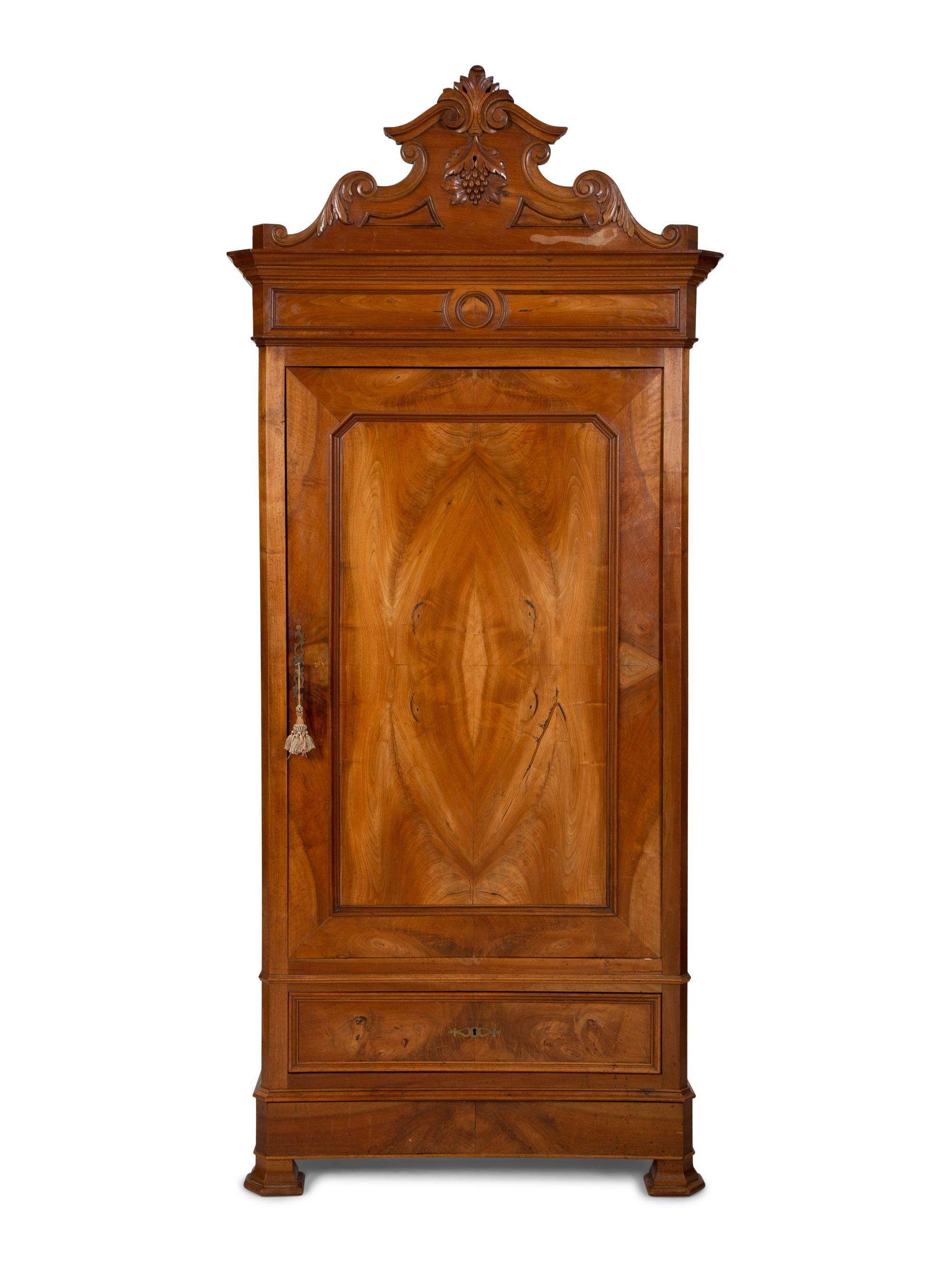 An Italian Figured Walnut Wardrobe Cabinet