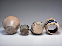 Four Cobalt Decorated Stoneware Vessels