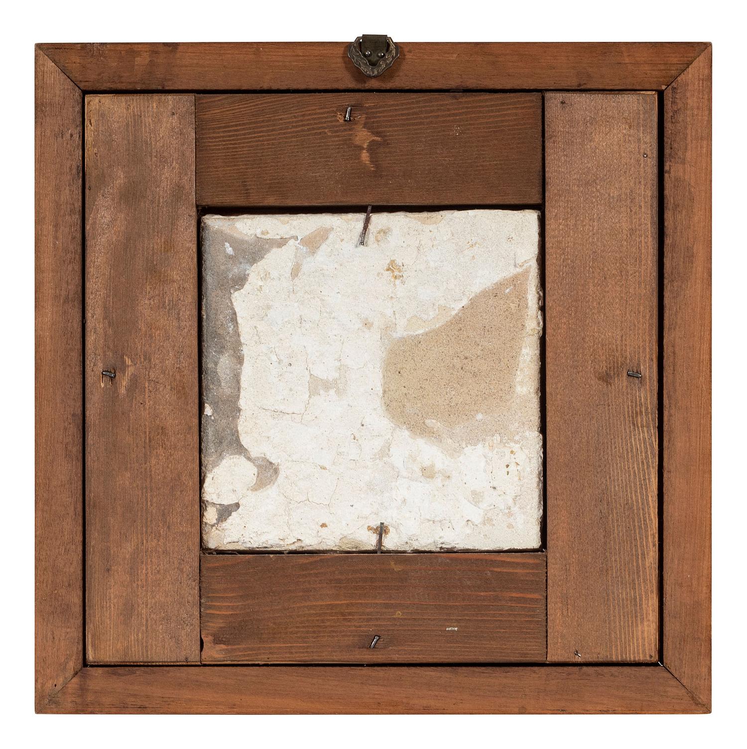 A Set of Five Framed Puce Delft Tiles