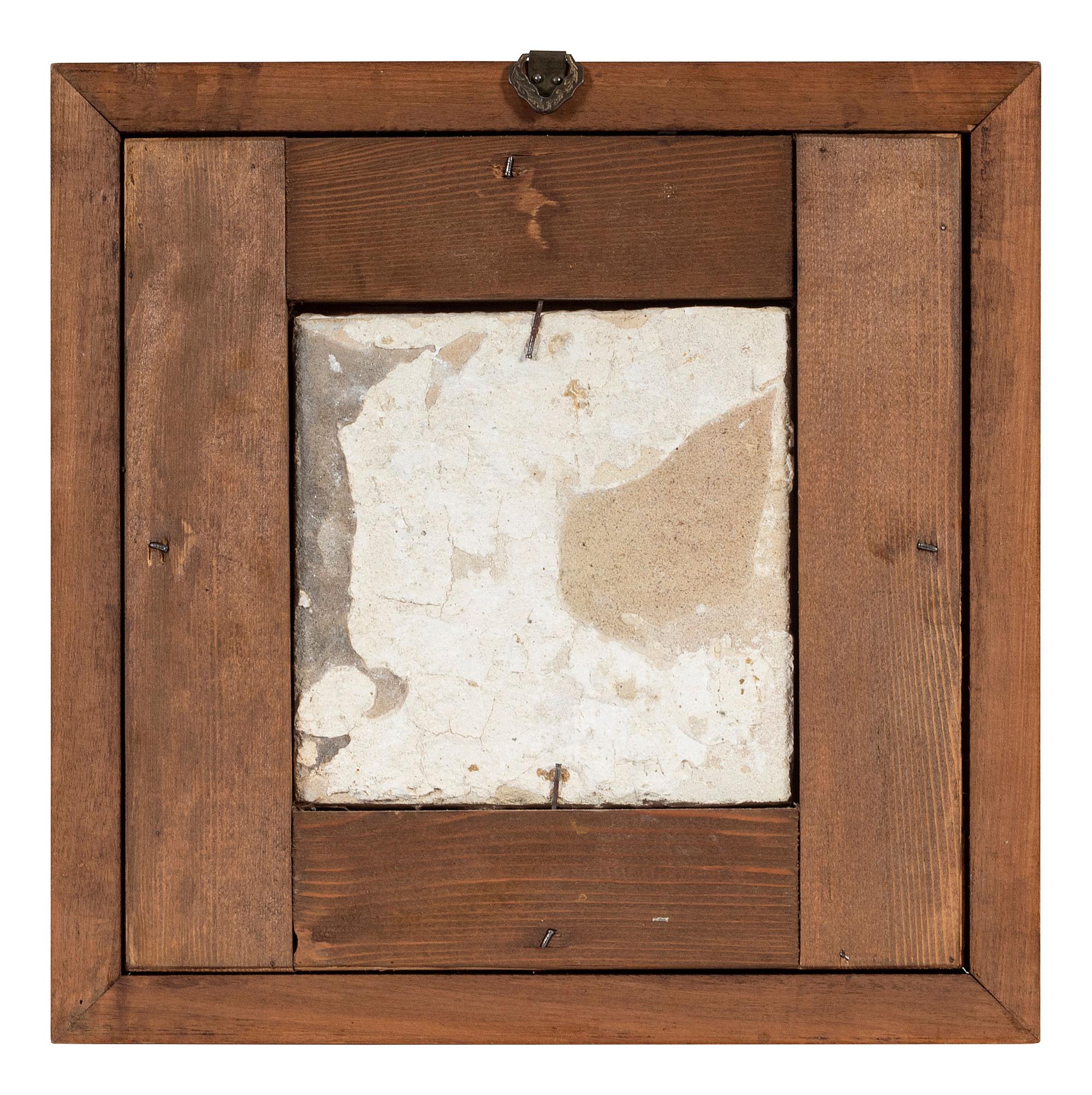 A Set of Five Framed Puce Delft Tiles
