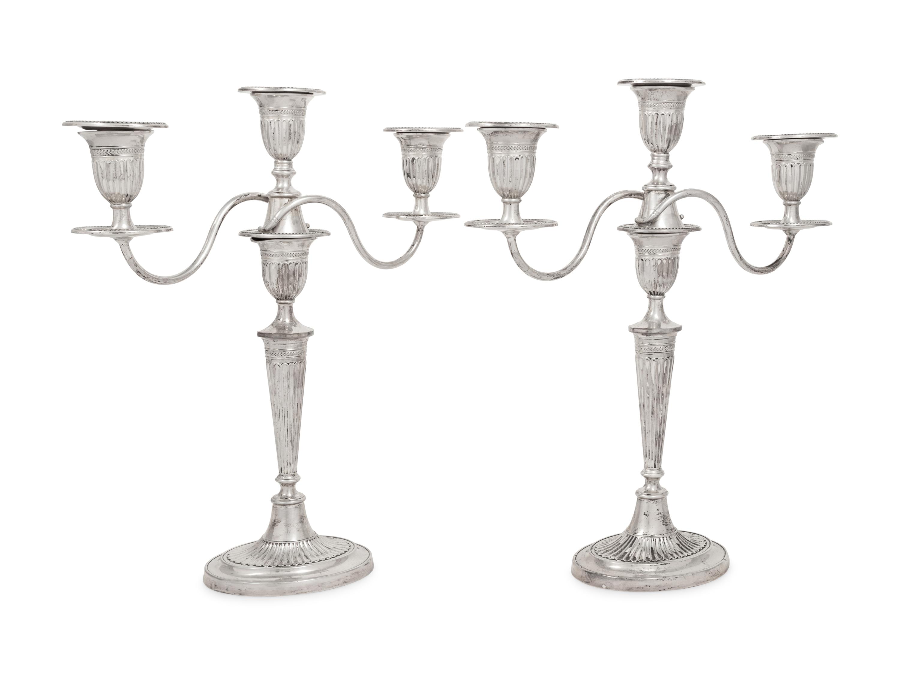 A Pair of Silver Three-Light Candelabra