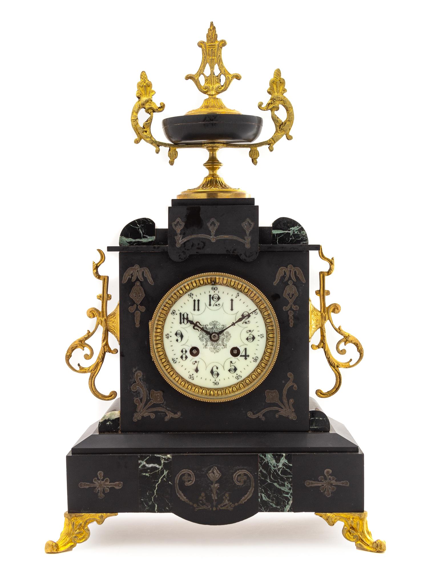 A French Gilt Metal Mounted Slate Mantel Clock