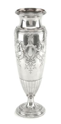 An American Silver Vase, International Silver Co., Meriden, CT, of elongated baluster form, the body worked to show two vacant cartouch