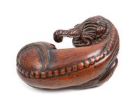 A Chinese Hardwood Figure of an Elephant Length 11 1/2 inches. — 20TH CENTURY