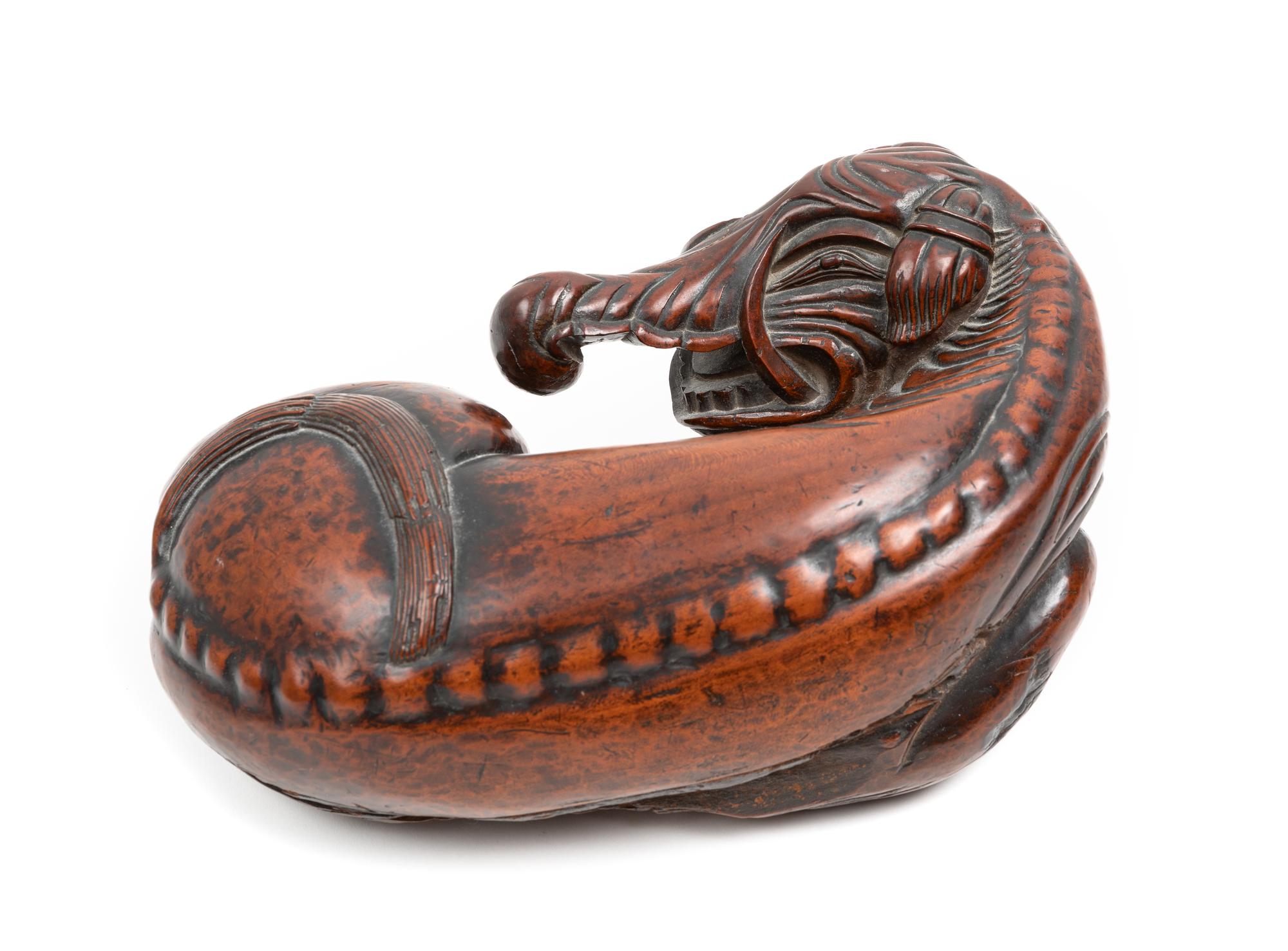 A Chinese Hardwood Figure of an Elephant Length 11 1/2 inches. — 20TH CENTURY