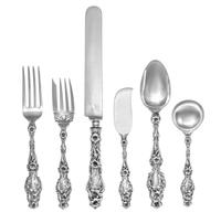 An American Silver Flatware Service, Whiting Mfg. Co., New York, NY, Lily pattern, comprising: 12 dinner knives 12 dinner forks 20 lunc