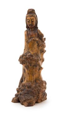 A Carved Rootwood Figure of a Guanyin Height 19 inches.