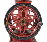 An Enterprise No. 5 Painted and Flag Decorated Cast Iron Coffee Mill