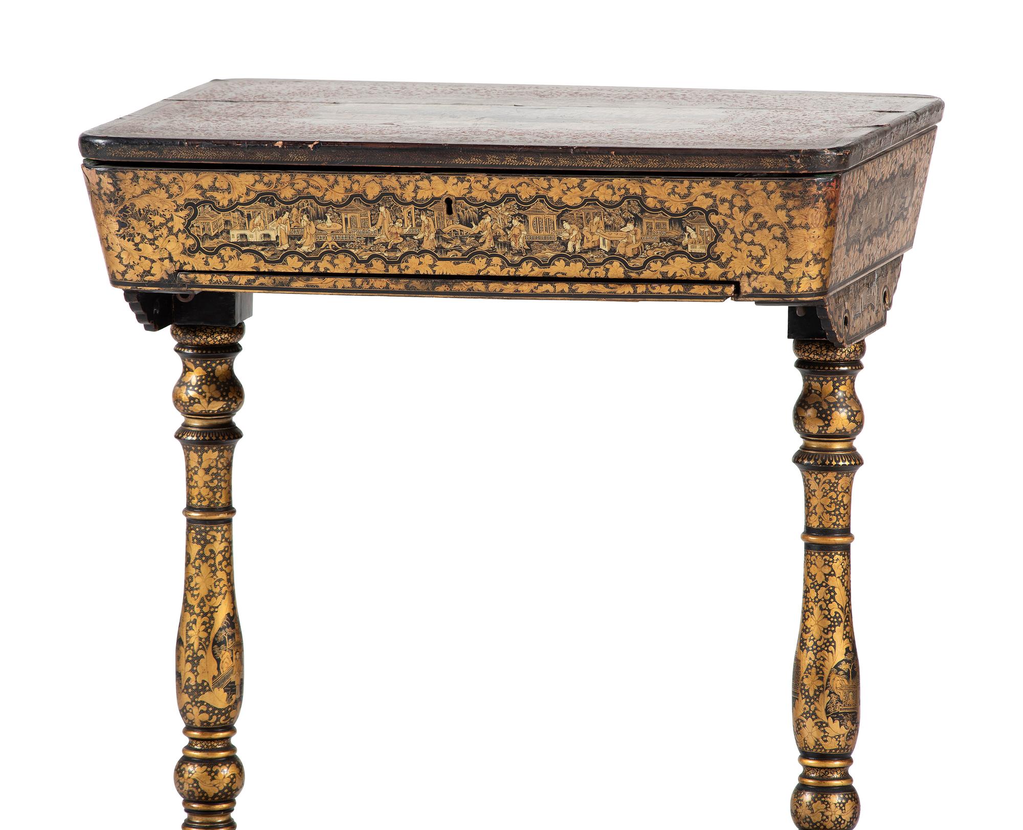 A Chinese Export Gilt and Black Lacquered Sewing Table