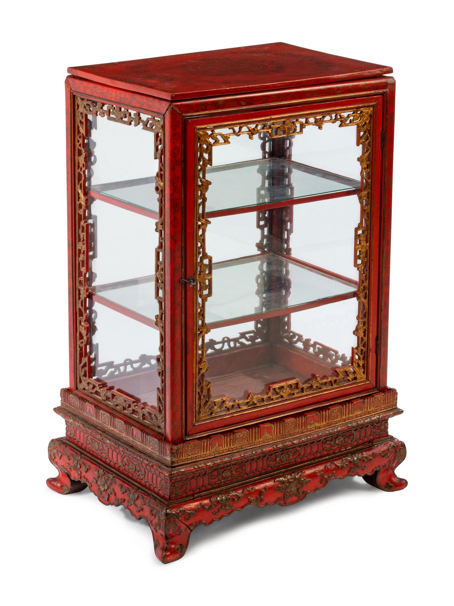 A Chinese Parcel Gilt Vitrine