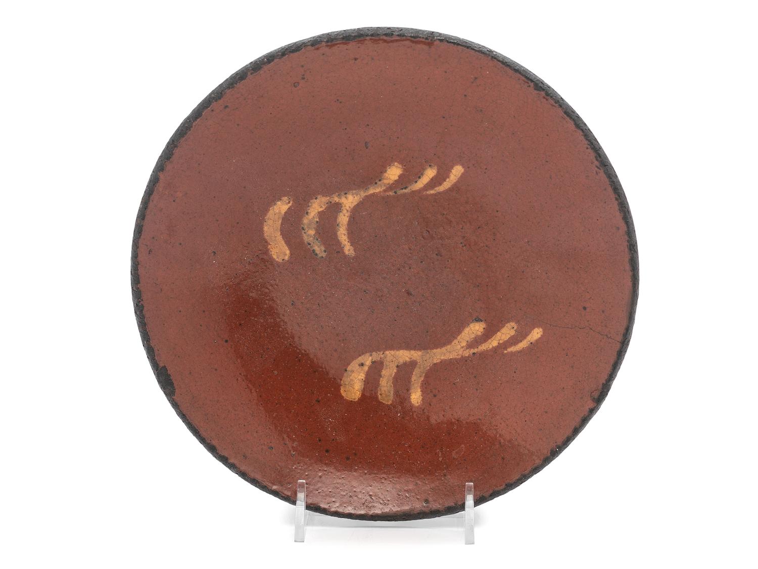 A Redware Slip Glazed Plate