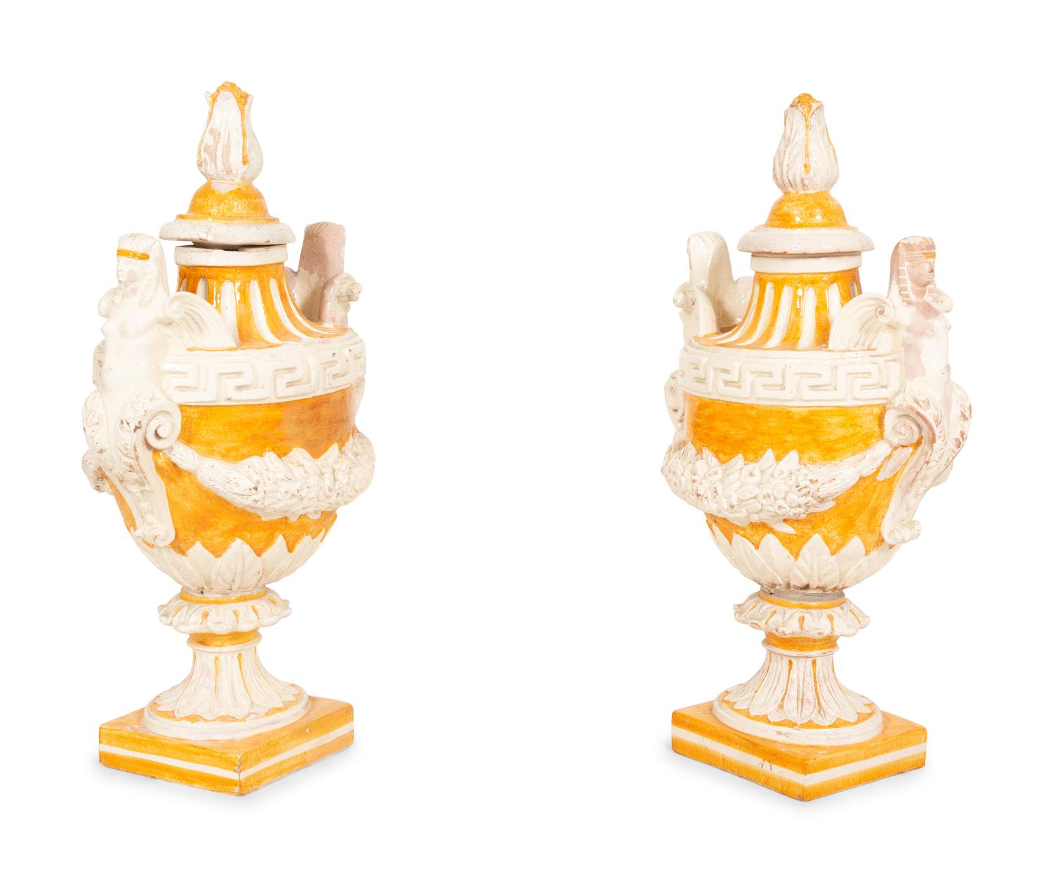 A Pair of Italian Glazed Terracotta Covered Urns