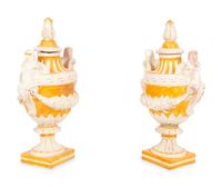 A Pair of Italian Glazed Terracotta Covered Urns
