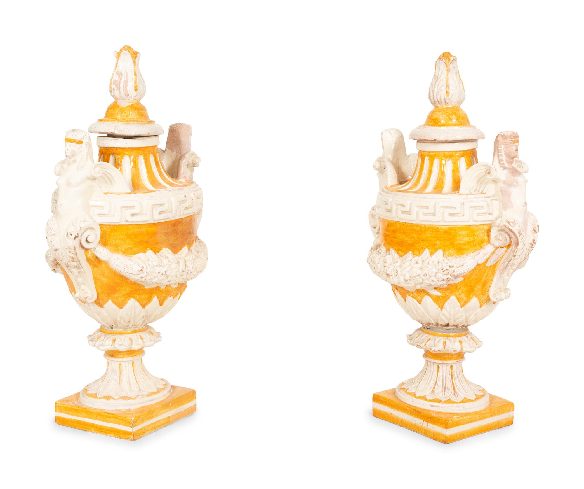 A Pair of Italian Glazed Terracotta Covered Urns
