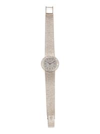 PATEK PHILLIPE, WHITE GOLD AND DIAMOND WATCH RETAILED BY AND SIGNED GÜBELIN