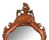 A Venetian Style Red and Gilt Japanned Mirror
