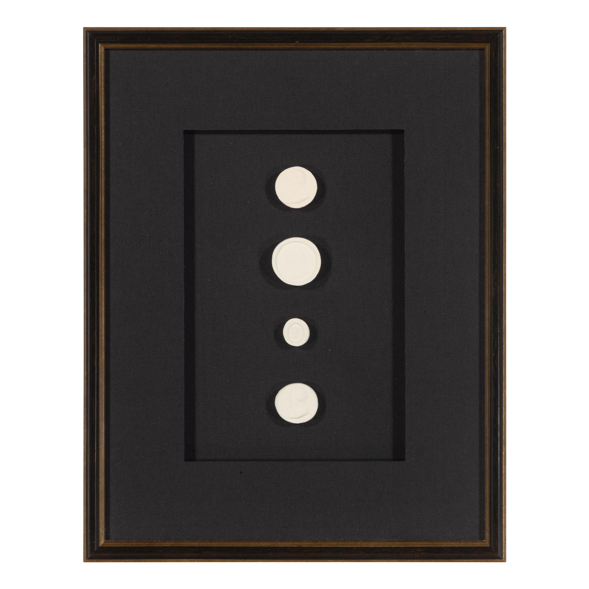 A Set of Three Framed Groups of Plaster Intaglios
