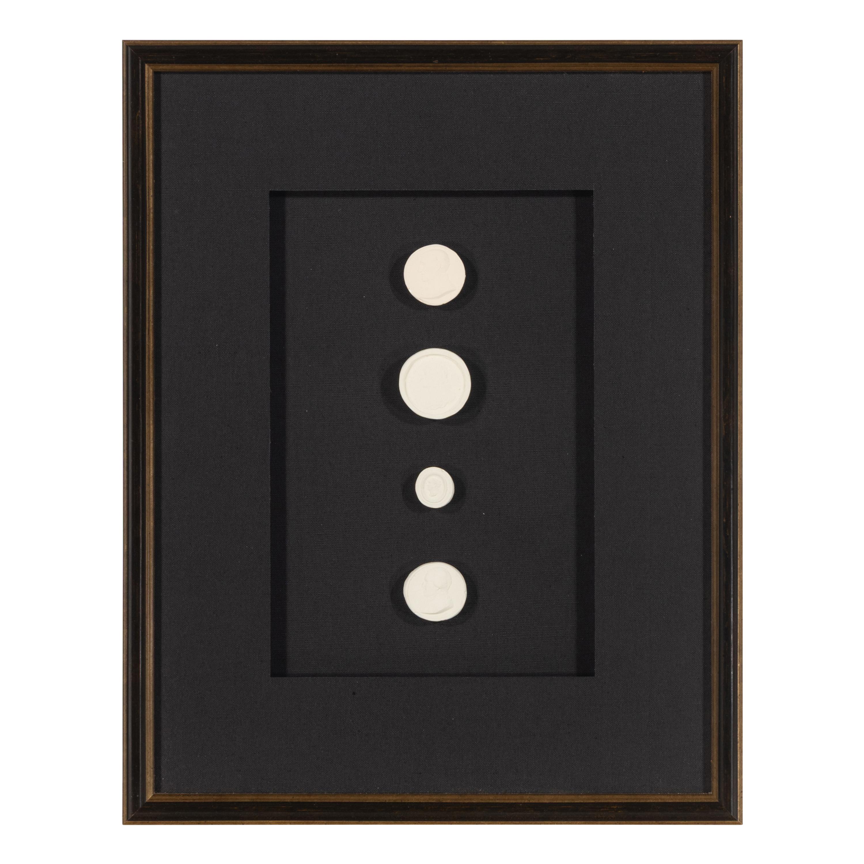 A Set of Three Framed Groups of Plaster Intaglios