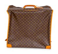 A Louis Vuitton Folding Soft Garment Bag — 20TH CENTURY