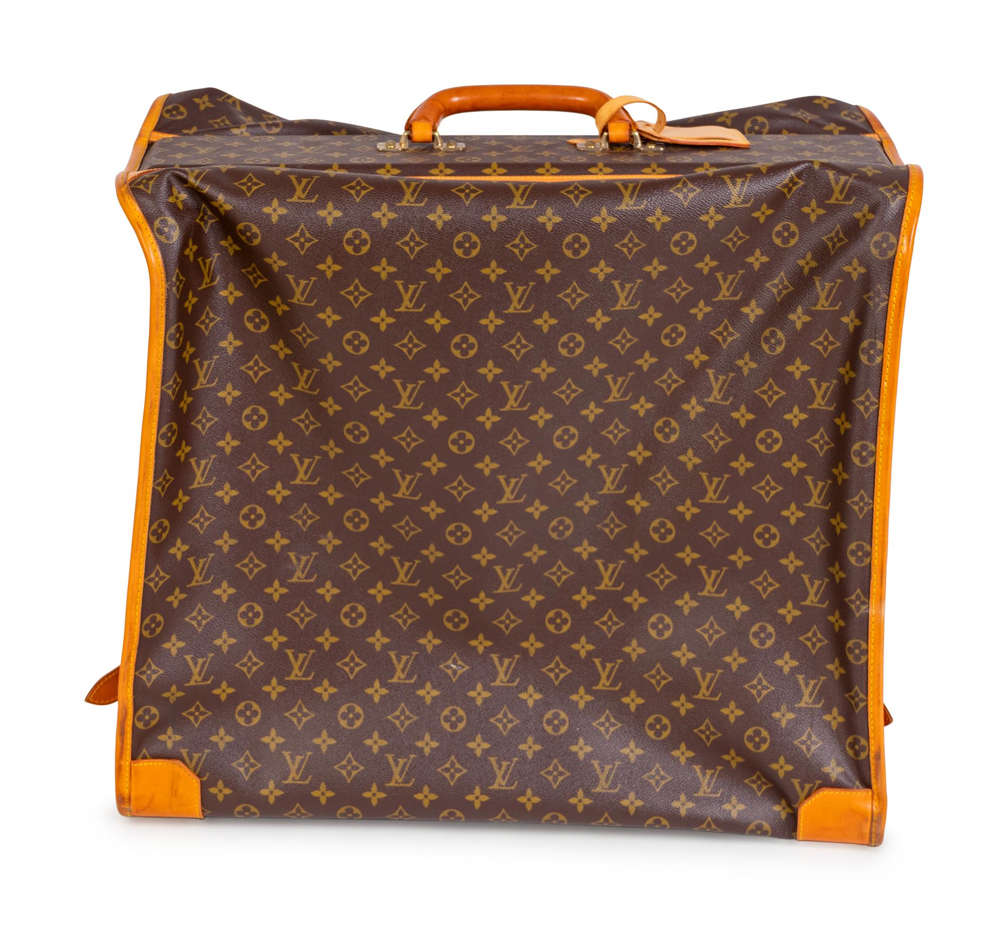 A Louis Vuitton Folding Soft Garment Bag — 20TH CENTURY