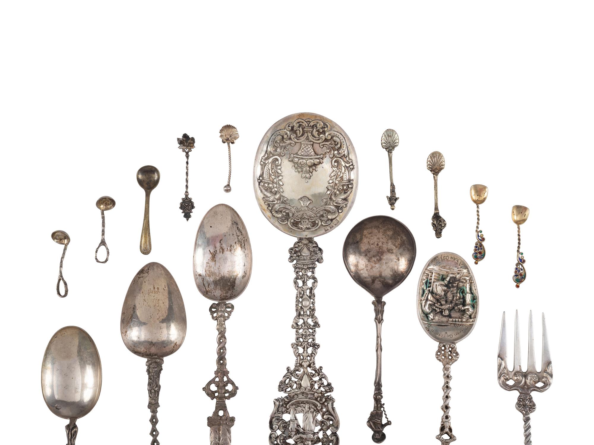 Twenty-Two Silver, Gilt and Enamel Souvenir and Serving Spoons and a Fork