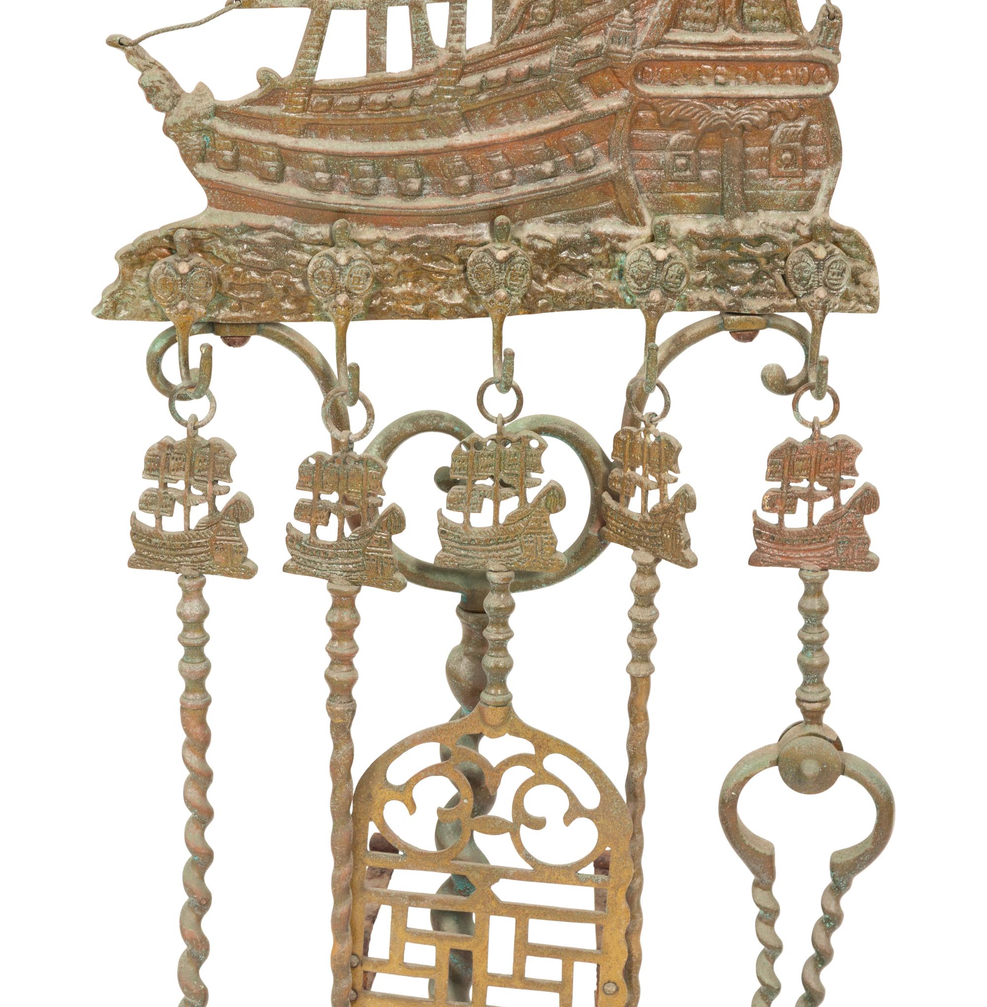 A Mizner Wrought Iron Fireplace Stand with Five Implements