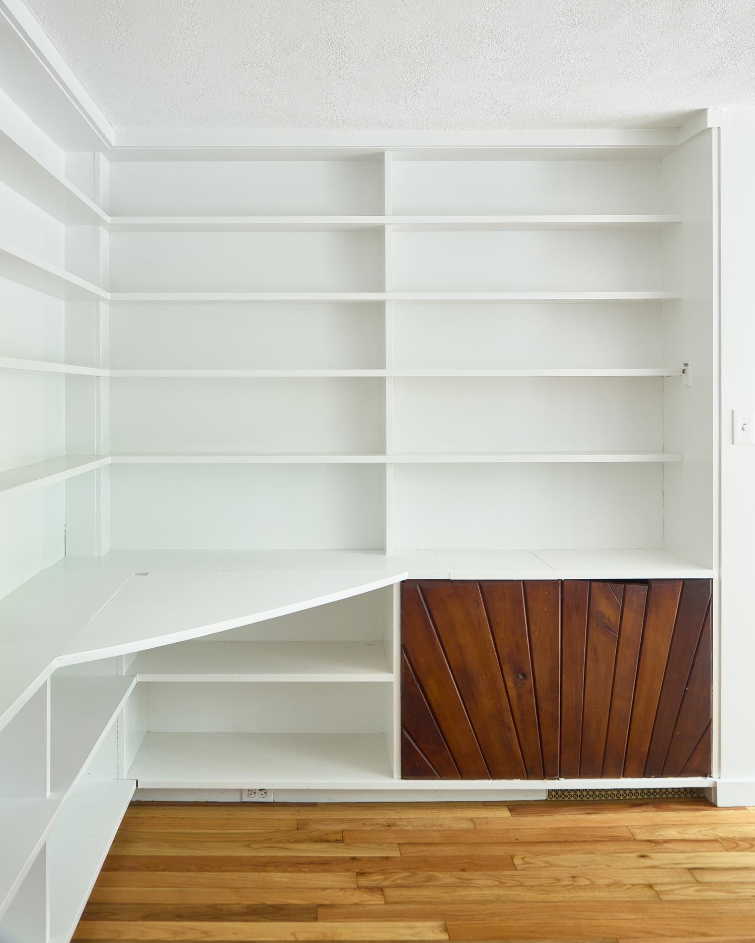 Built-in bookshelves and storage cabinet, 1954