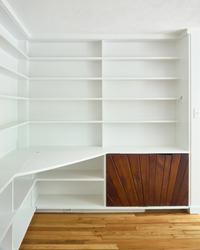 Built-in bookshelves and storage cabinet, 1954