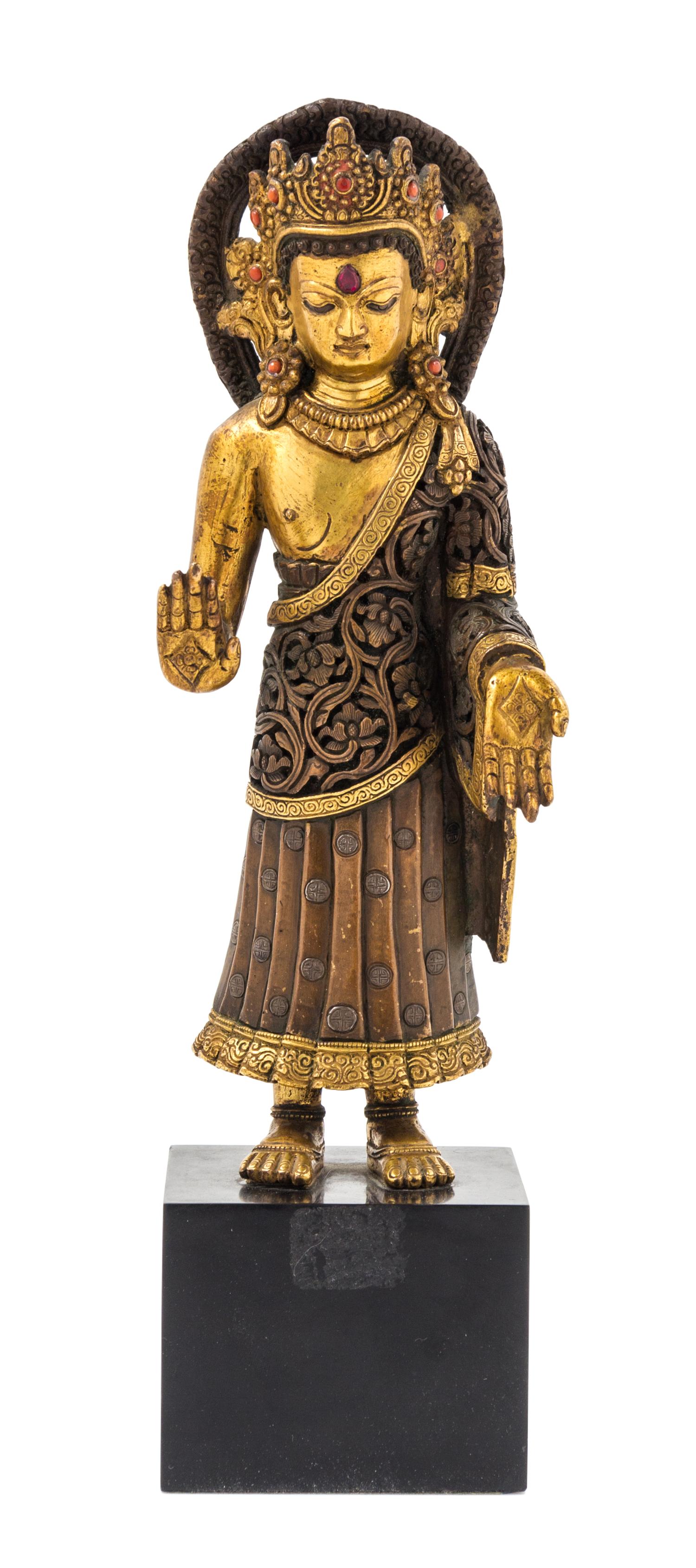 A Gilt Bronze Figure of a Standing Deity