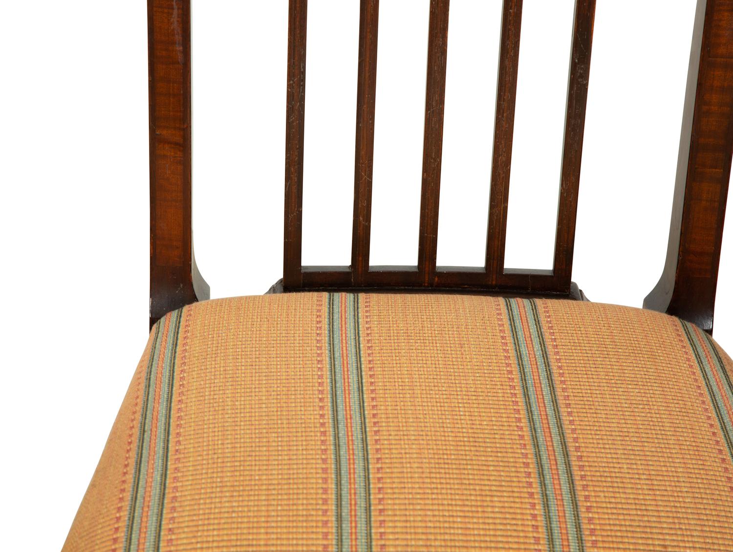A Set of Eight George III Gothic Style Mahogany Dining Chairs