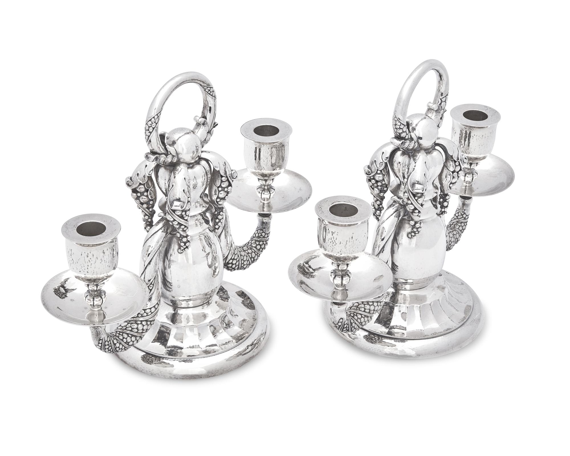 A Pair of Georg Jensen Silver Two-Light Candelabra