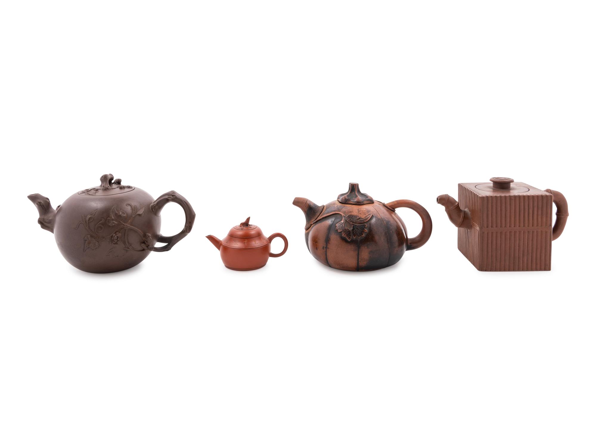 Four Yixing Pottery Teapots