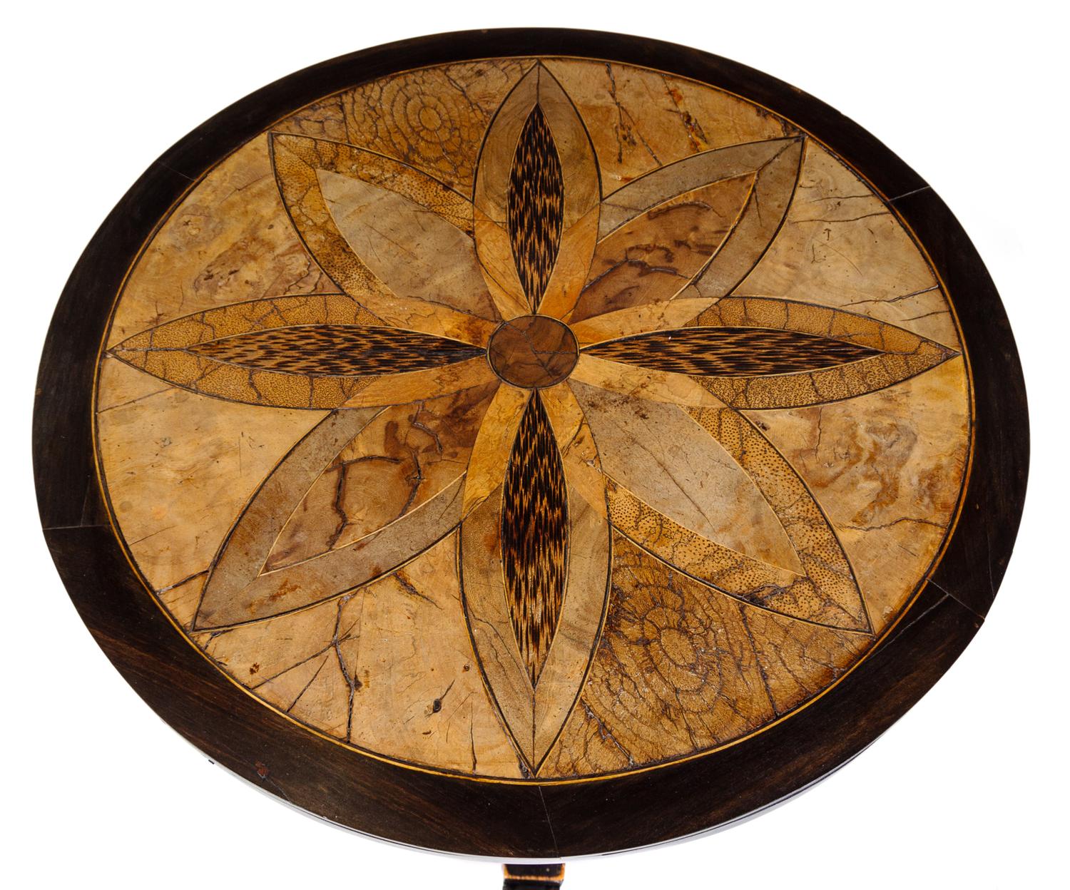 A Specimen Wood Pedestal Table Height 27 x diameter 24 1/2 inches.