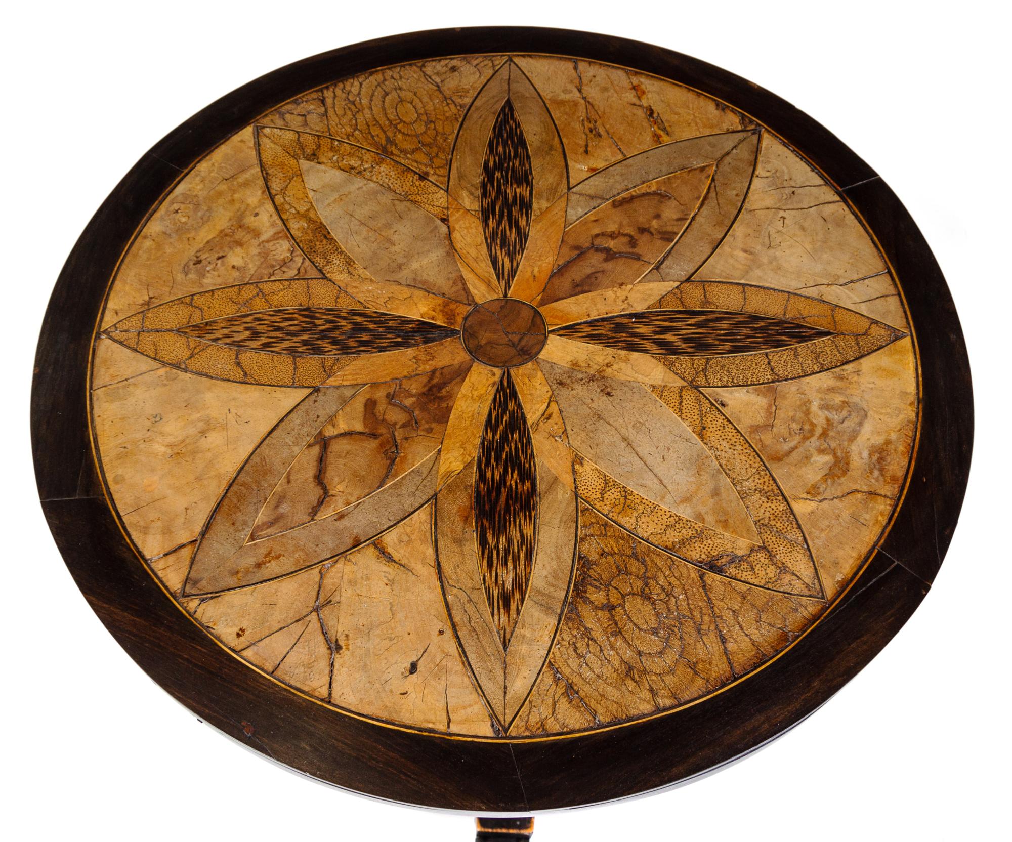 A Specimen Wood Pedestal Table Height 27 x diameter 24 1/2 inches.