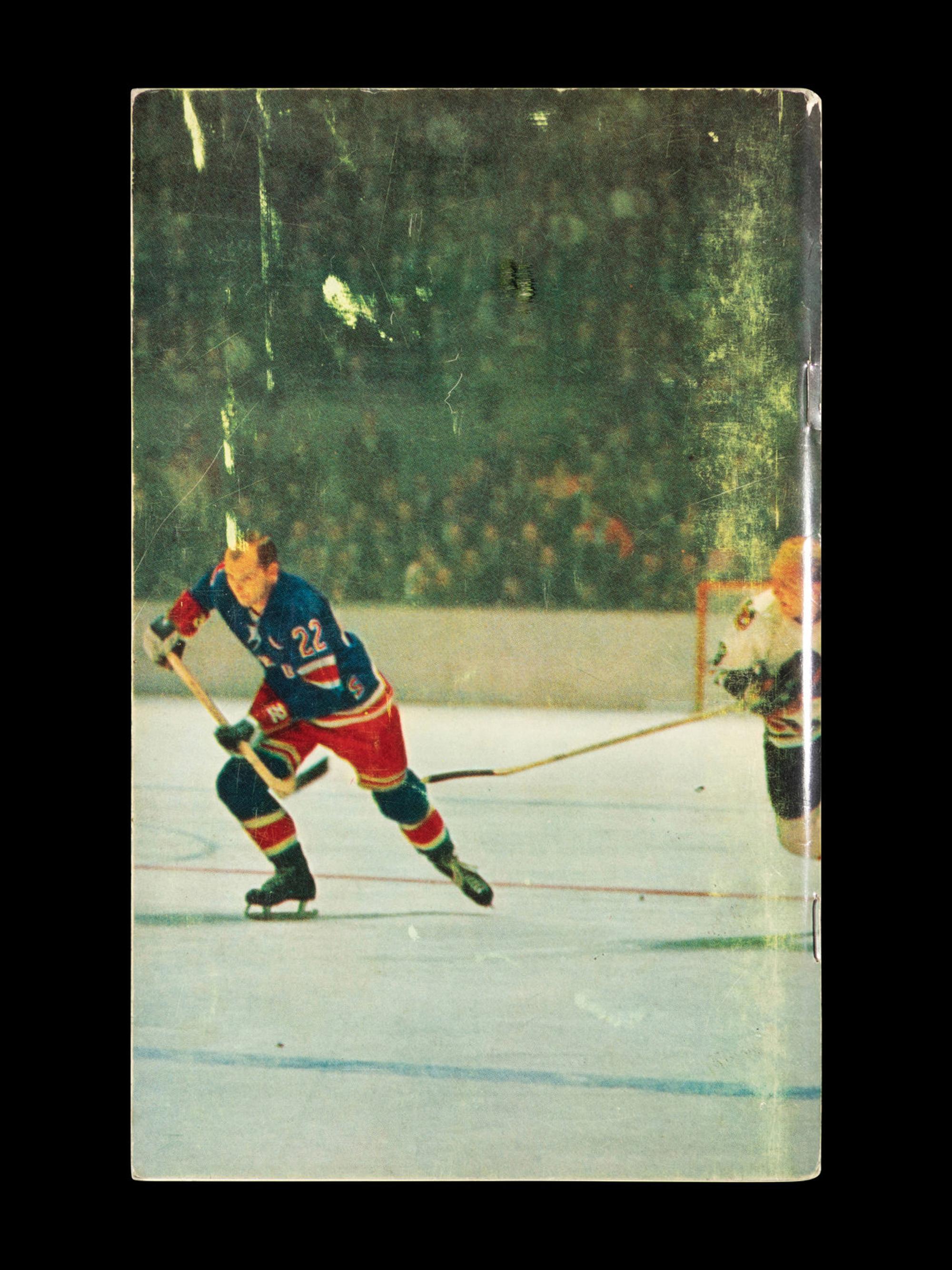 A Group of 16 1960s - 1980s New York Rangers Blue Book Media Guides,
