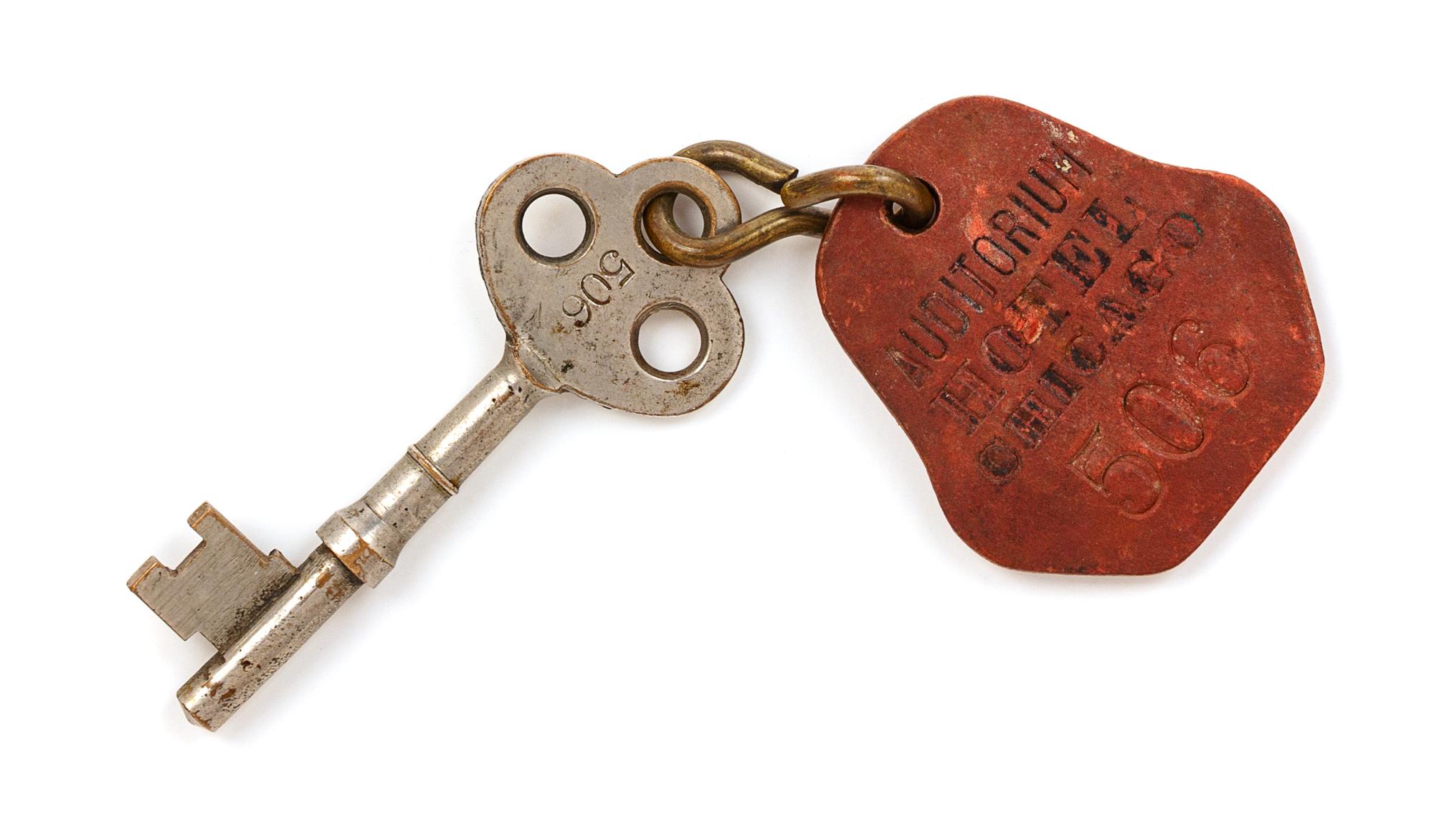 A Louis Sullivan Auditorium Building Brass Door Key and Fob Length 6 3/8 x width 1 3/4 inches. — CIRCA 1900