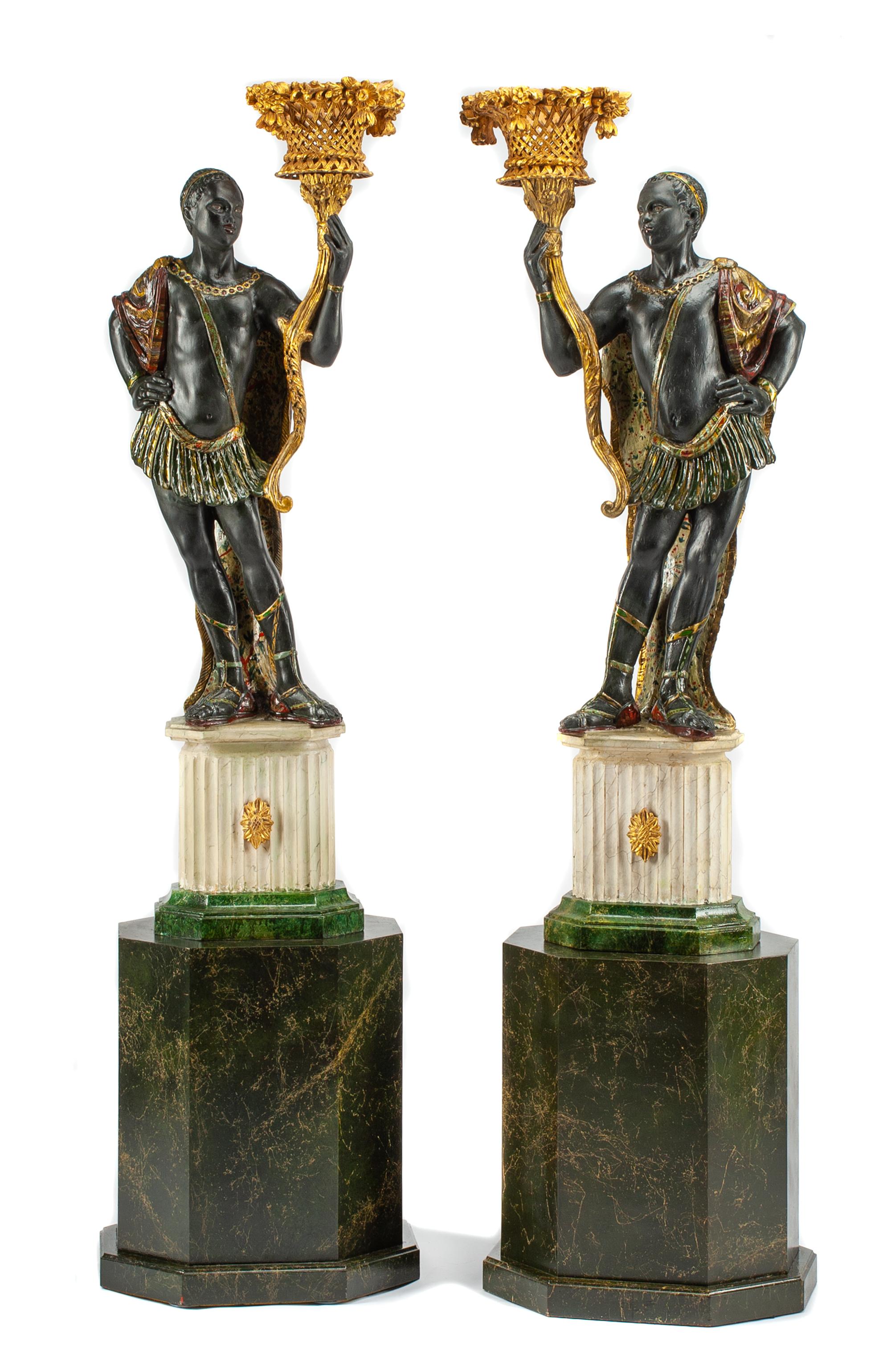 A Pair of Venetian Carved, Gilt and Polychrome Decorated Figures Height 70 inches.