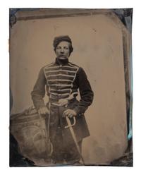 [CIVIL WAR]. Full plate tintype of Civil War drummer James V. Roberts, 118th New York, posed with drum and weaponry. [ With :] personal, war-date Bible.