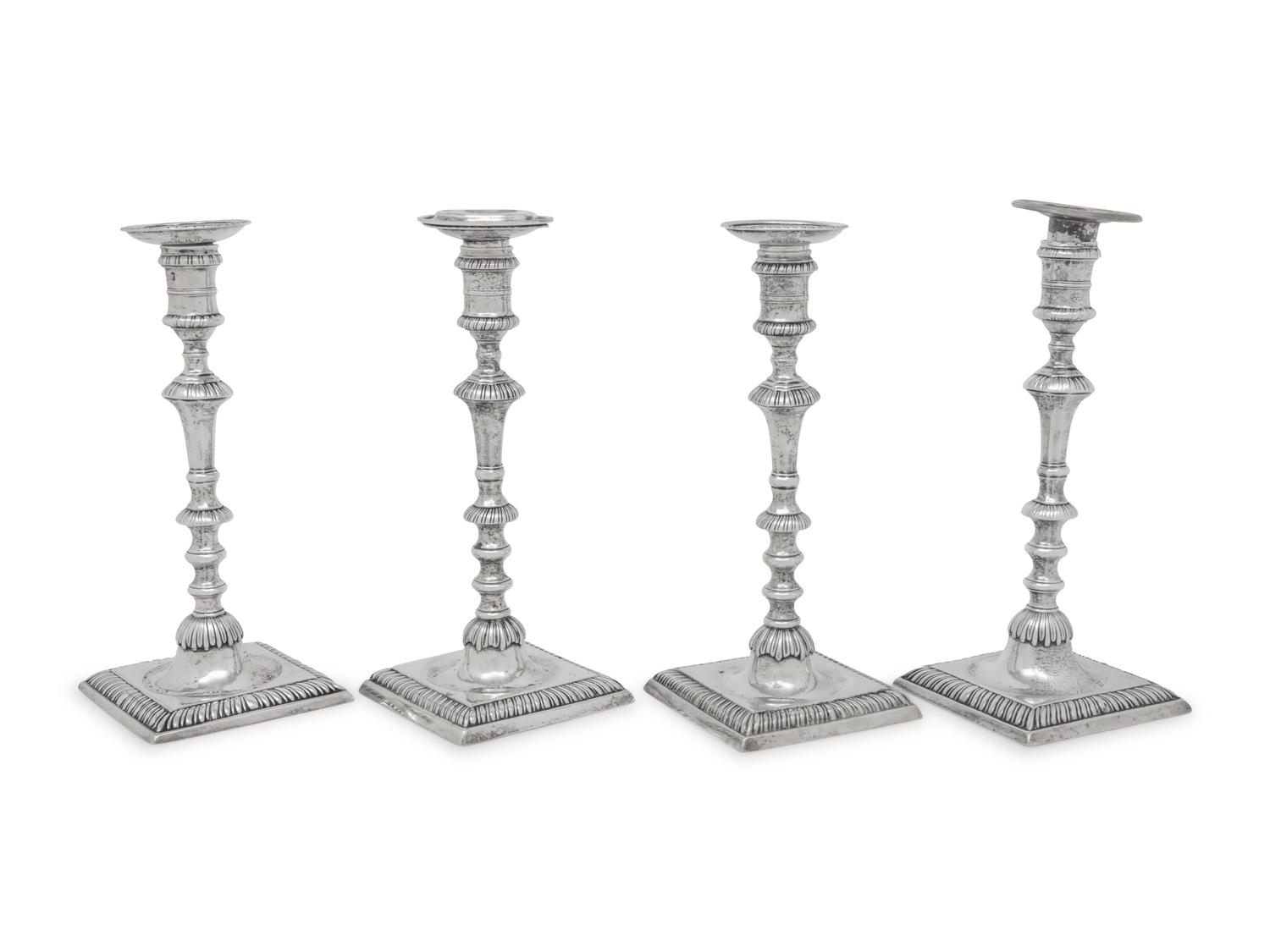 An Assembled Set of Four George III Silver Candlesticks