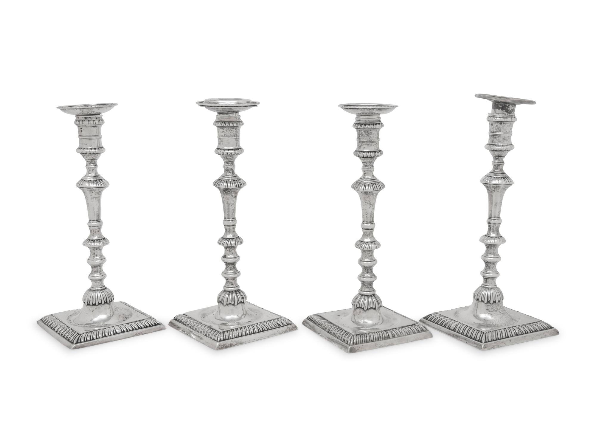 An Assembled Set of Four George III Silver Candlesticks