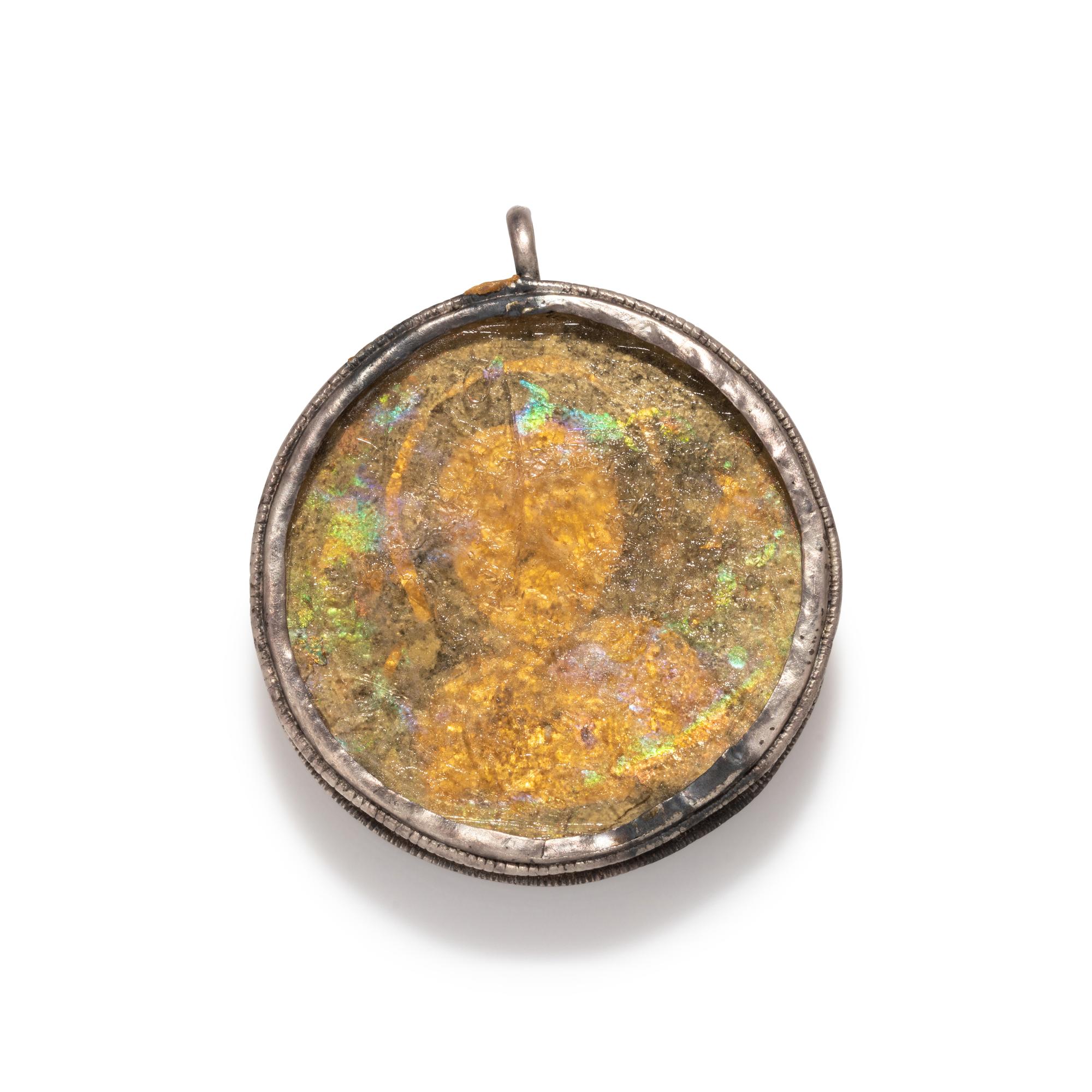 A Byzantine Silver and Glass Pendant with Biblical Scene