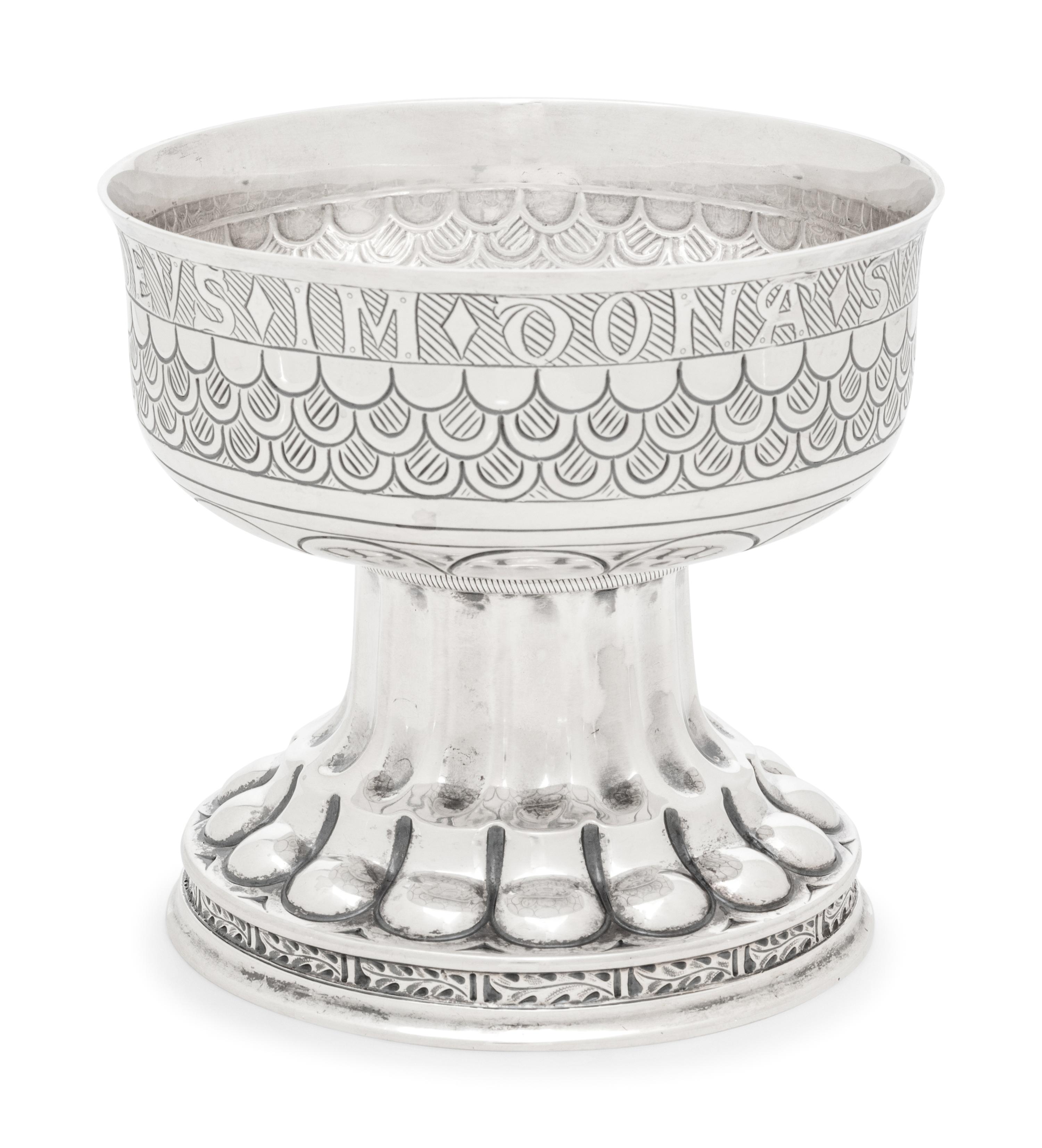 A Group of Six English Arts and Crafts Silver Table Articles