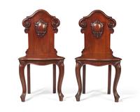 A pair of Victorian mahogany hall chairs, circa 1850