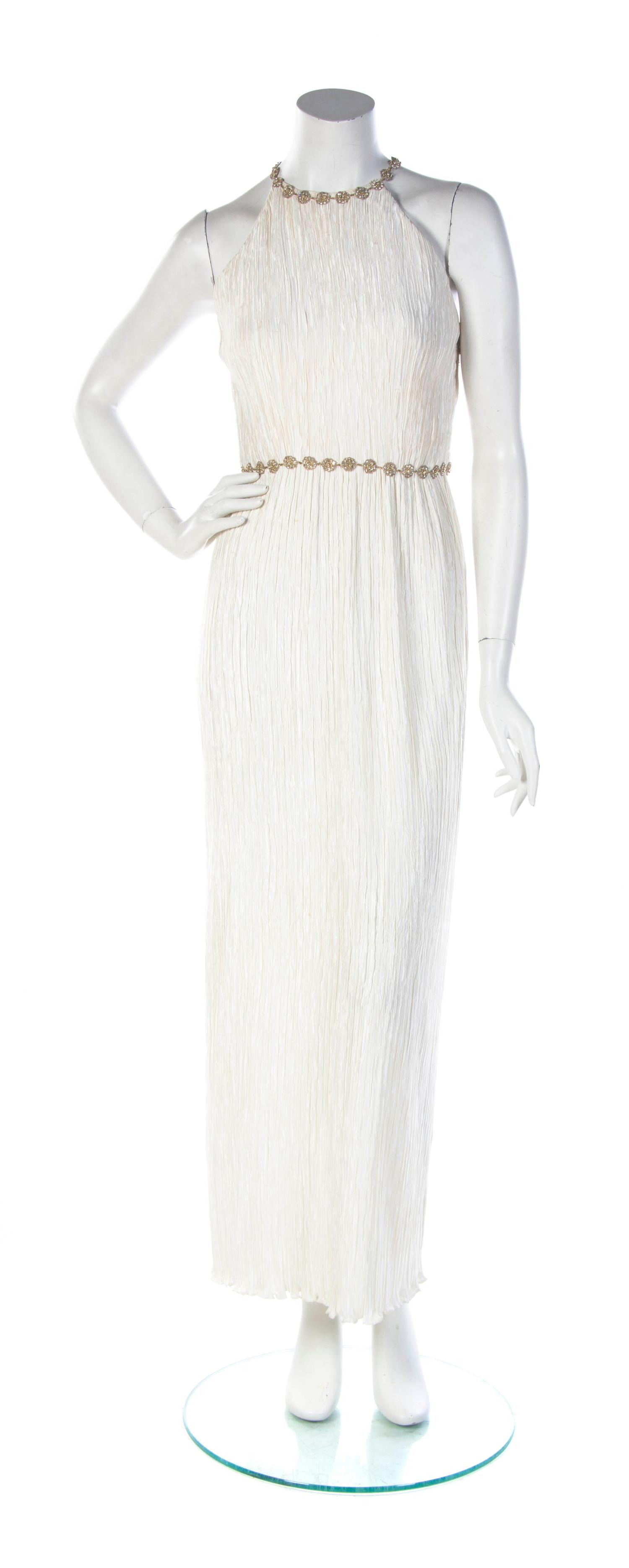A Mary McFadden Couture Ivory Pleated Halter Gown, Size 6.