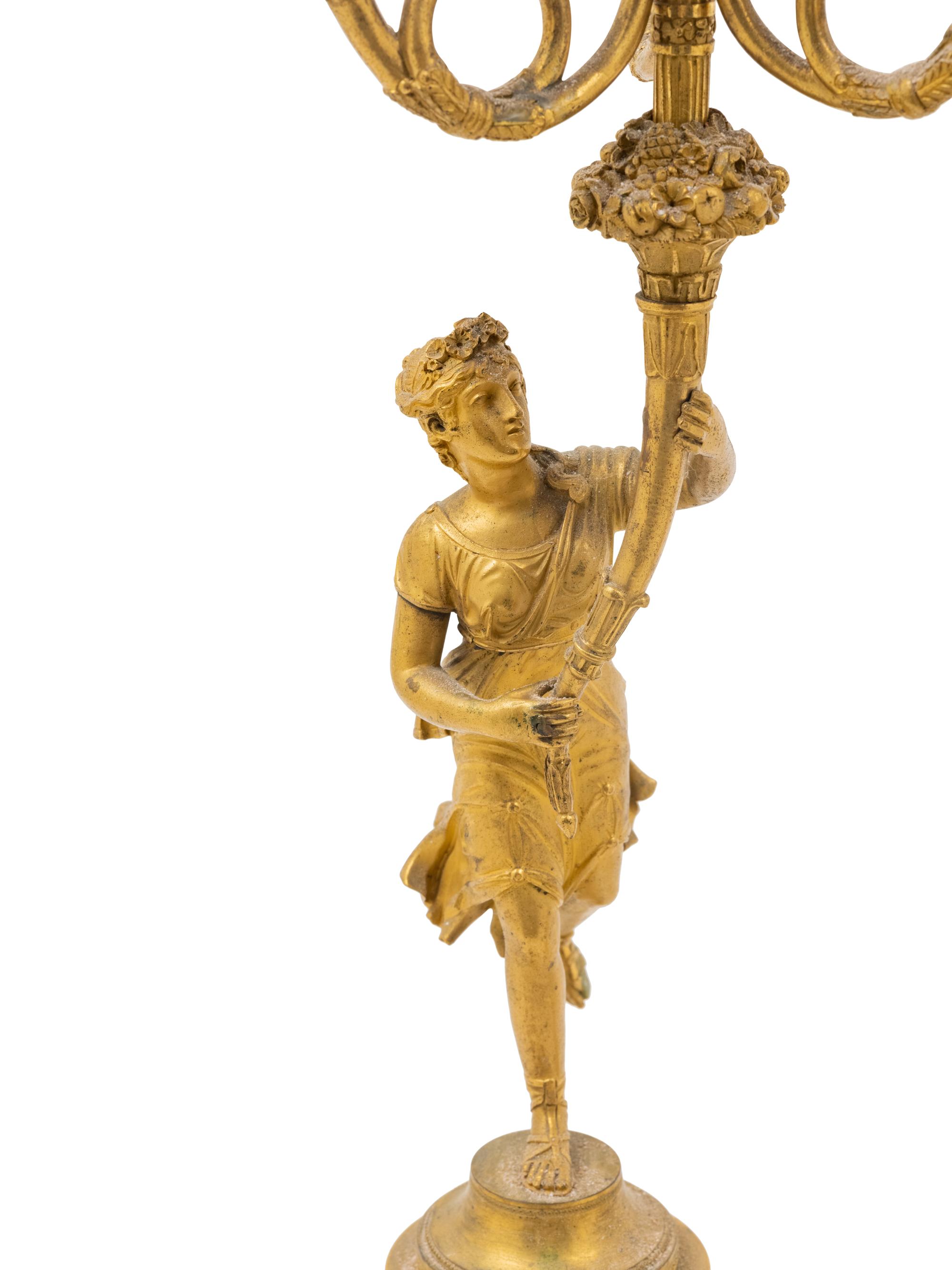 An Empire Style Parcel Gilt Mahogany Marble-Top Center Table