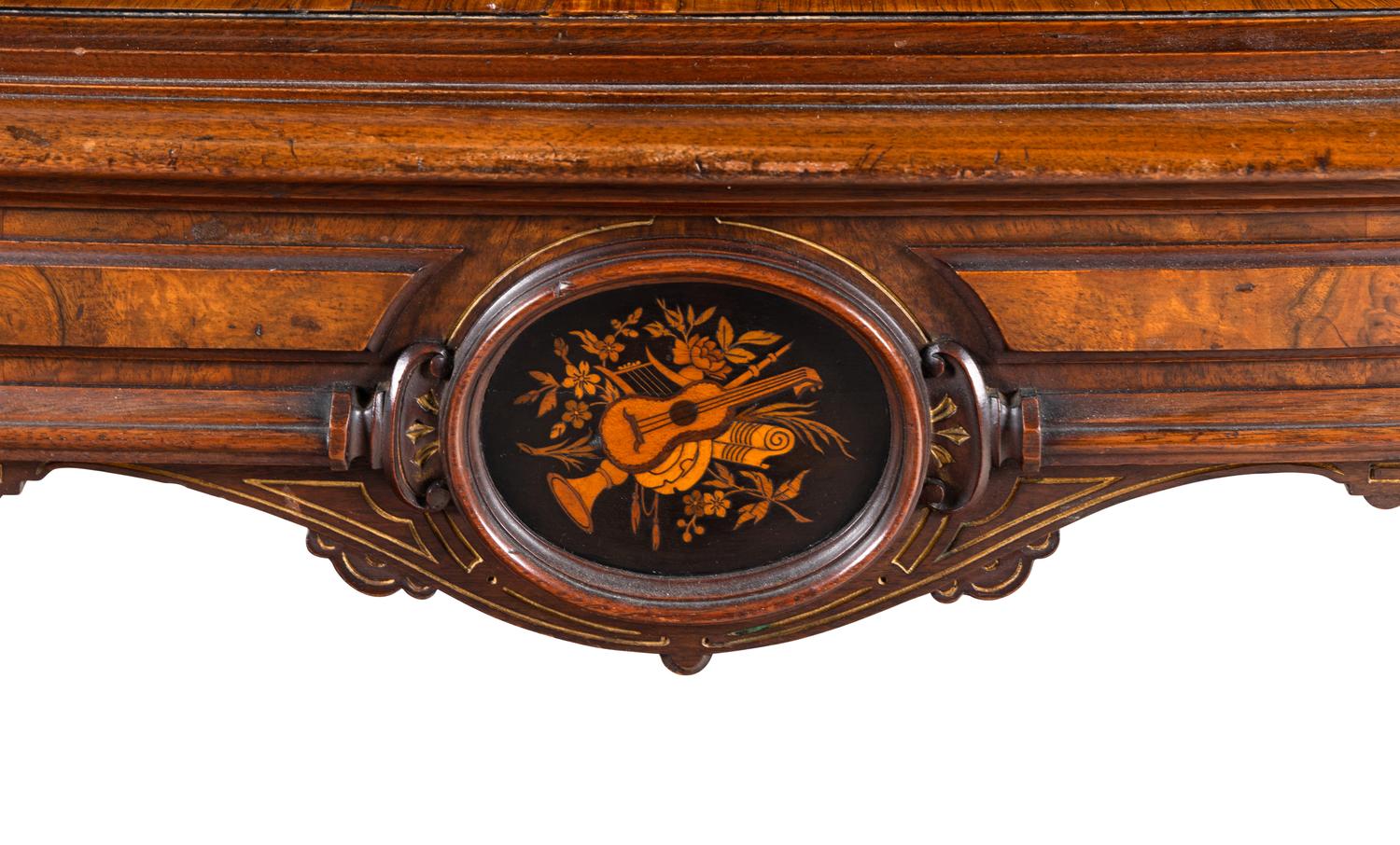 A Napoleon III Style Indian Rosewood and Marquetry Center Table