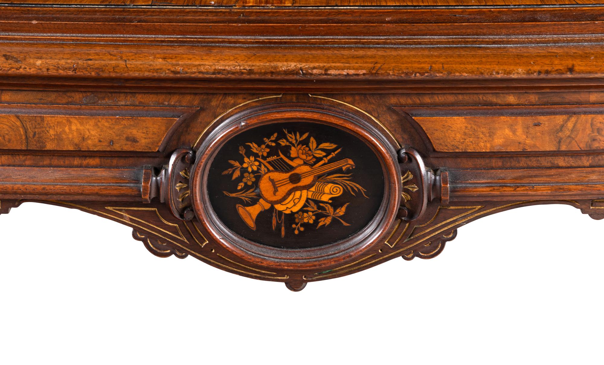 A Napoleon III Style Indian Rosewood and Marquetry Center Table